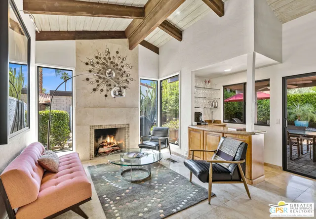 a view of a dining room and chairs and table