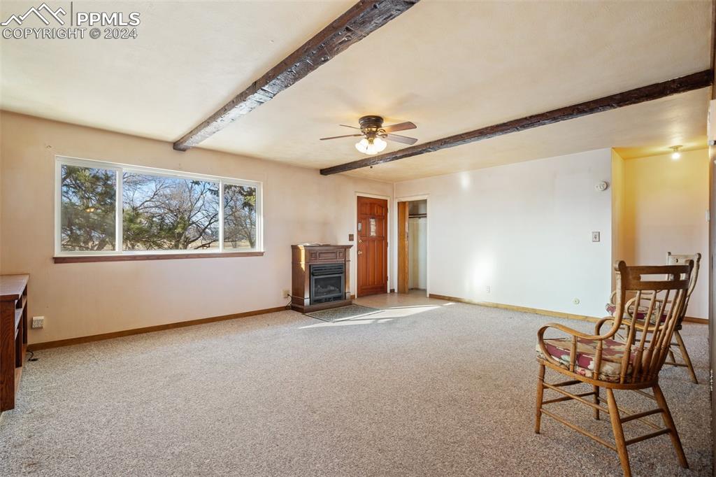 7615 Maverick Road Colorado Springs, CO 80908 - Photo 15 of 42 a view of an empty room with a window