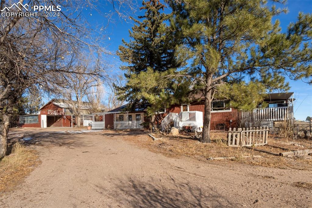 7615 Maverick Road Colorado Springs, CO 80908 - Photo 4 of 42 a row of house with outdoor space