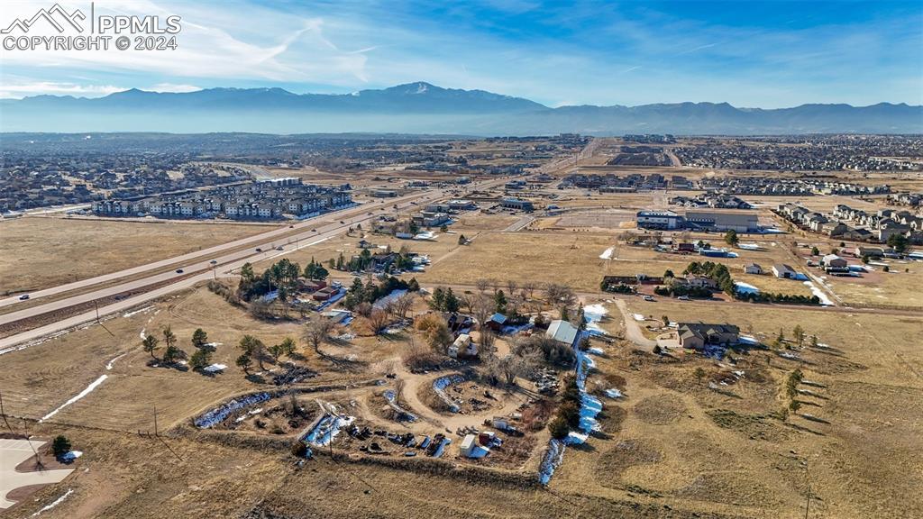 7615 Maverick Road Colorado Springs, CO 80908 - Photo 6 of 42 an aerial view of a city