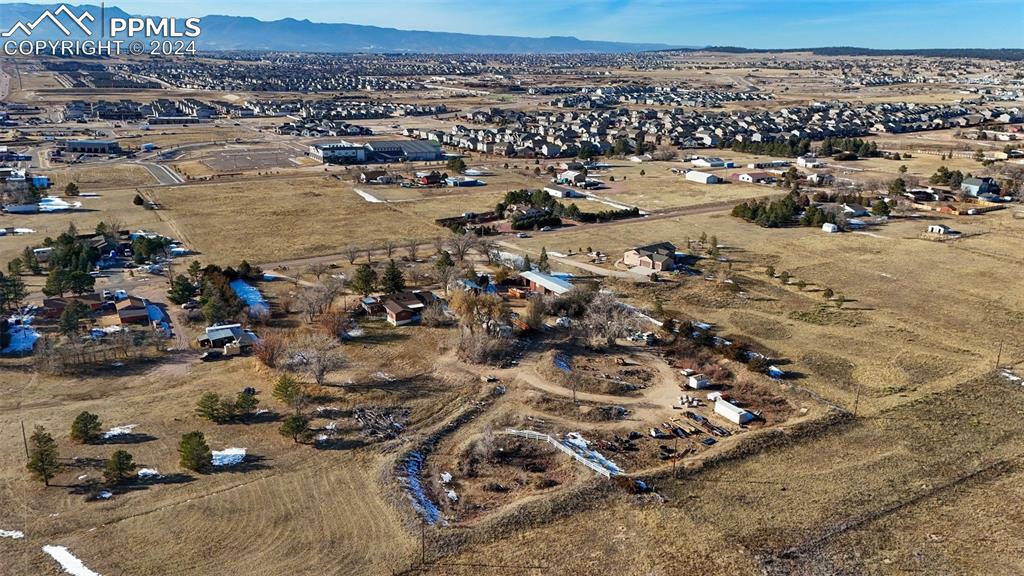 7615 Maverick Road Colorado Springs, CO 80908 - Photo 8 of 42 an aerial view of a city