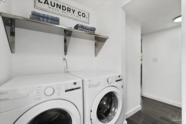 a view of storage and utility room with washer and dryer