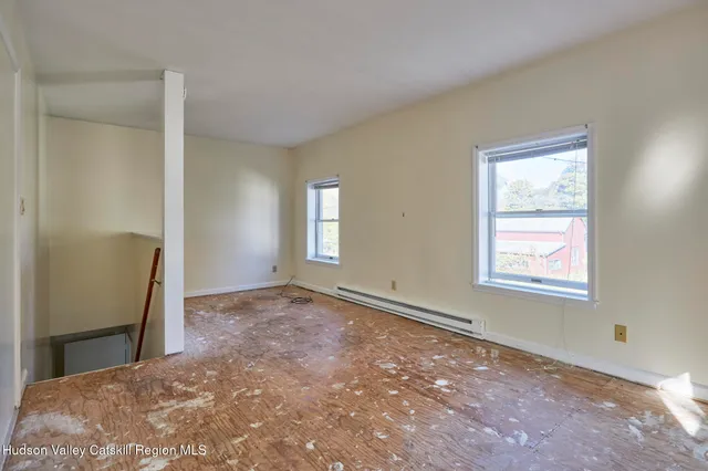 a view of an empty room and window