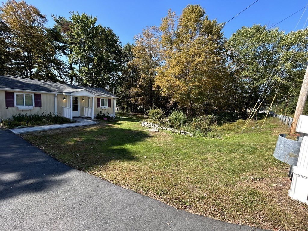 222 Gore Road Webster, MA 01570 - Photo 12 of 32 a view of a house with a yard