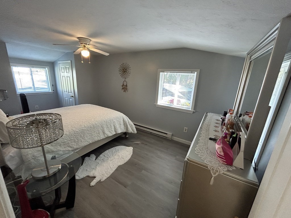 222 Gore Road Webster, MA 01570 - Photo 19 of 32 a bedroom with a bed and window