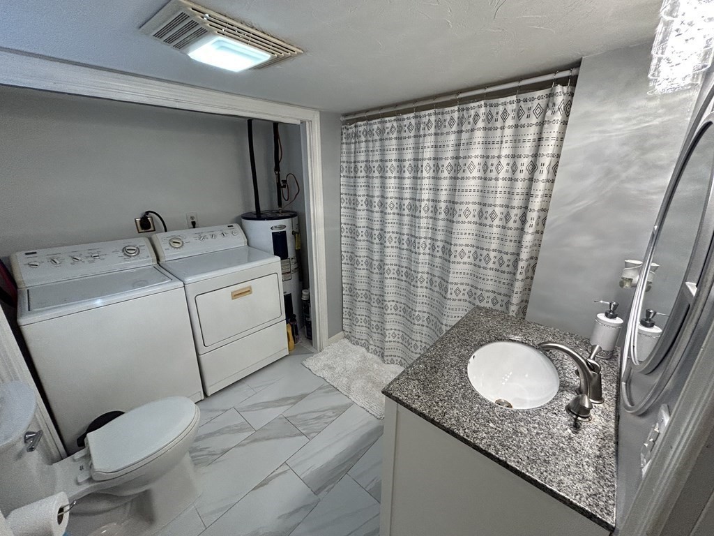 222 Gore Road Webster, MA 01570 - Photo 22 of 32 a bathroom with a sink toilet and shower