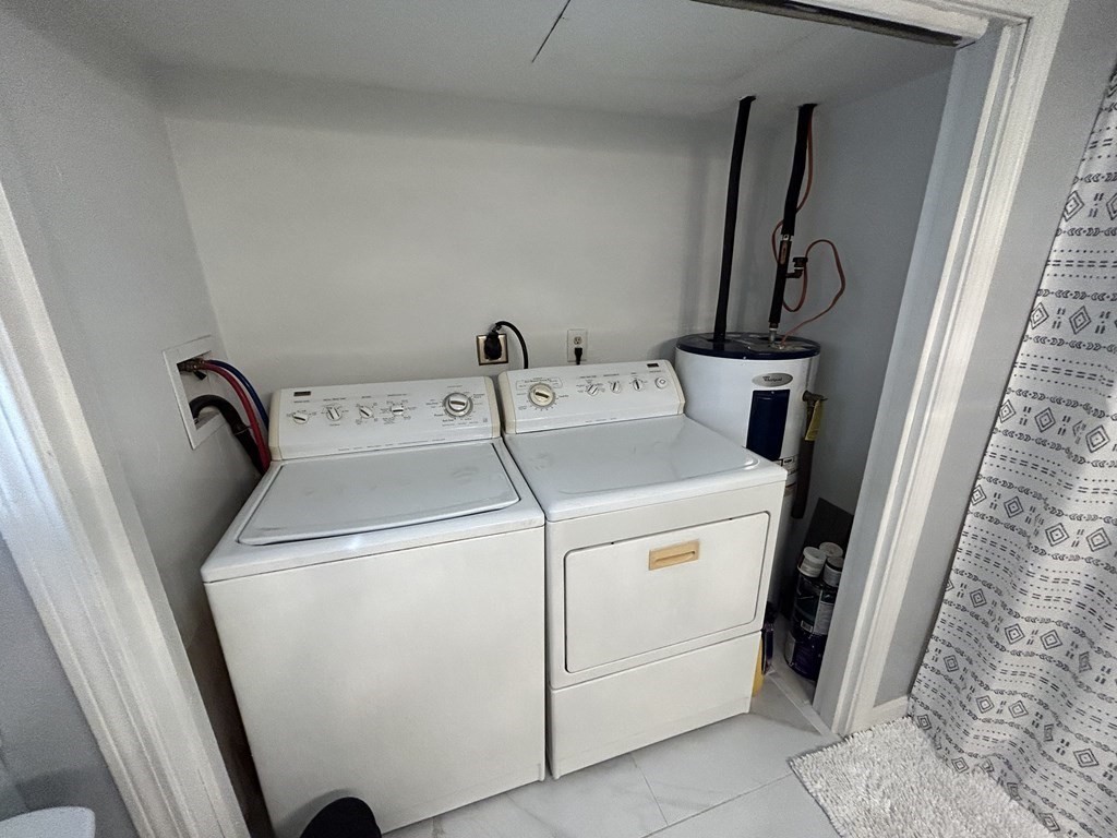 222 Gore Road Webster, MA 01570 - Photo 25 of 32 a utility room with dryer and washer