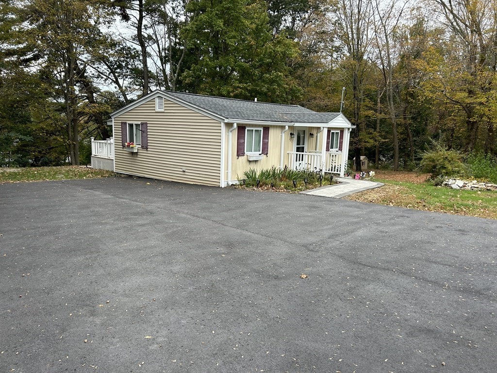 222 Gore Road Webster, MA 01570 - Photo 6 of 32 a view of a house with a yard