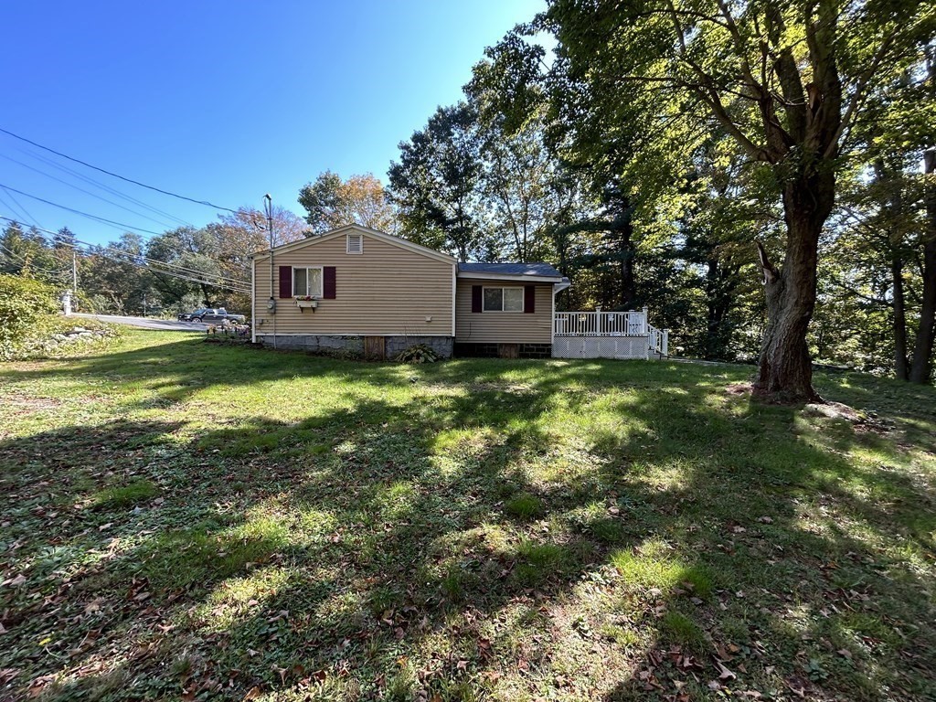222 Gore Road Webster, MA 01570 - Photo 7 of 32 a view of a house with a yard