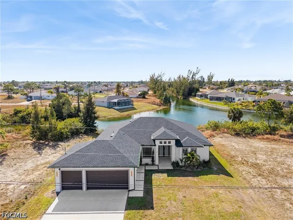a view of a lake with a big yard