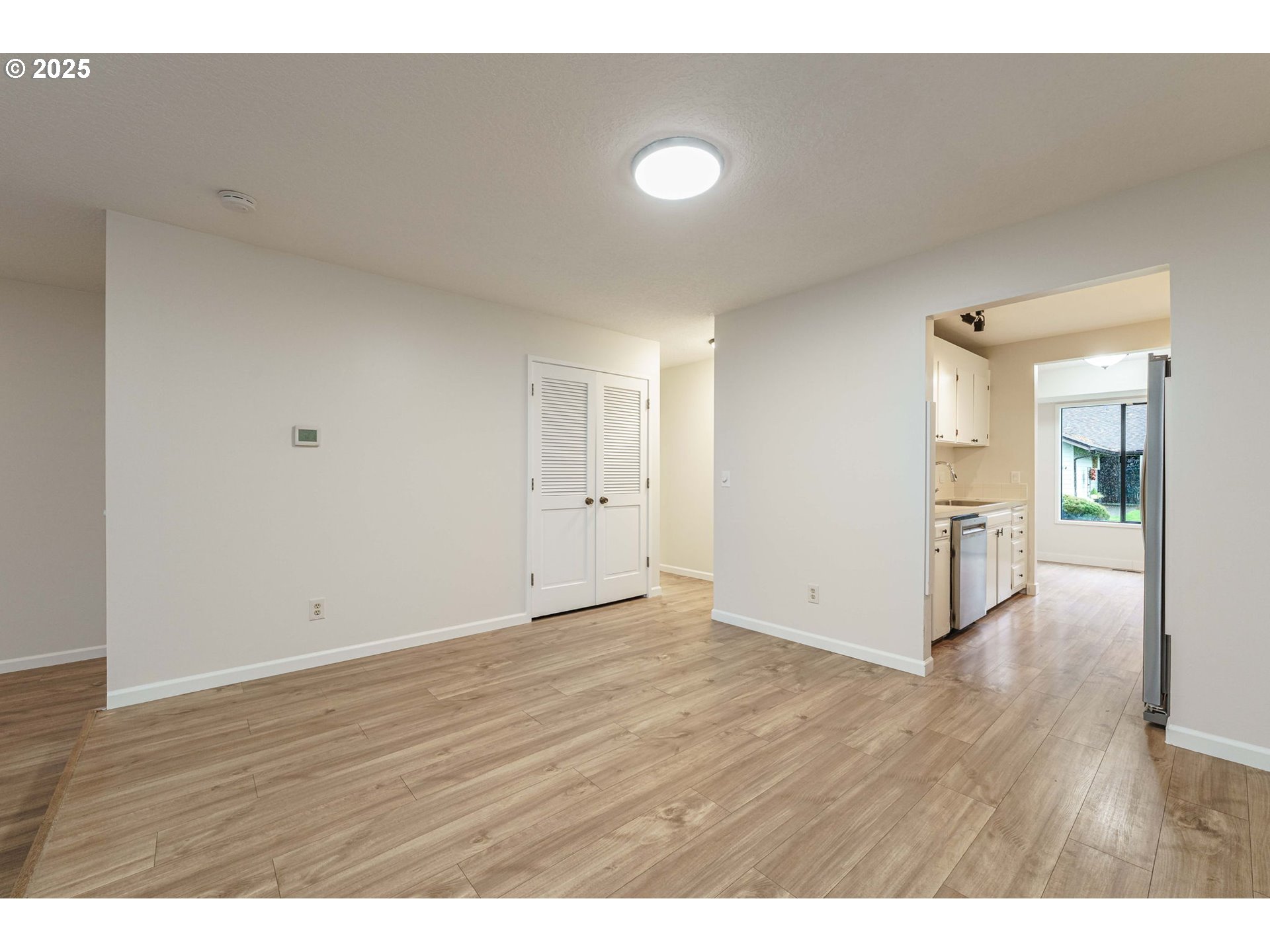 4248 Northeast 125th Place Portland, OR 97230 - Photo 11 of 42 a view of an empty room and wooden floor