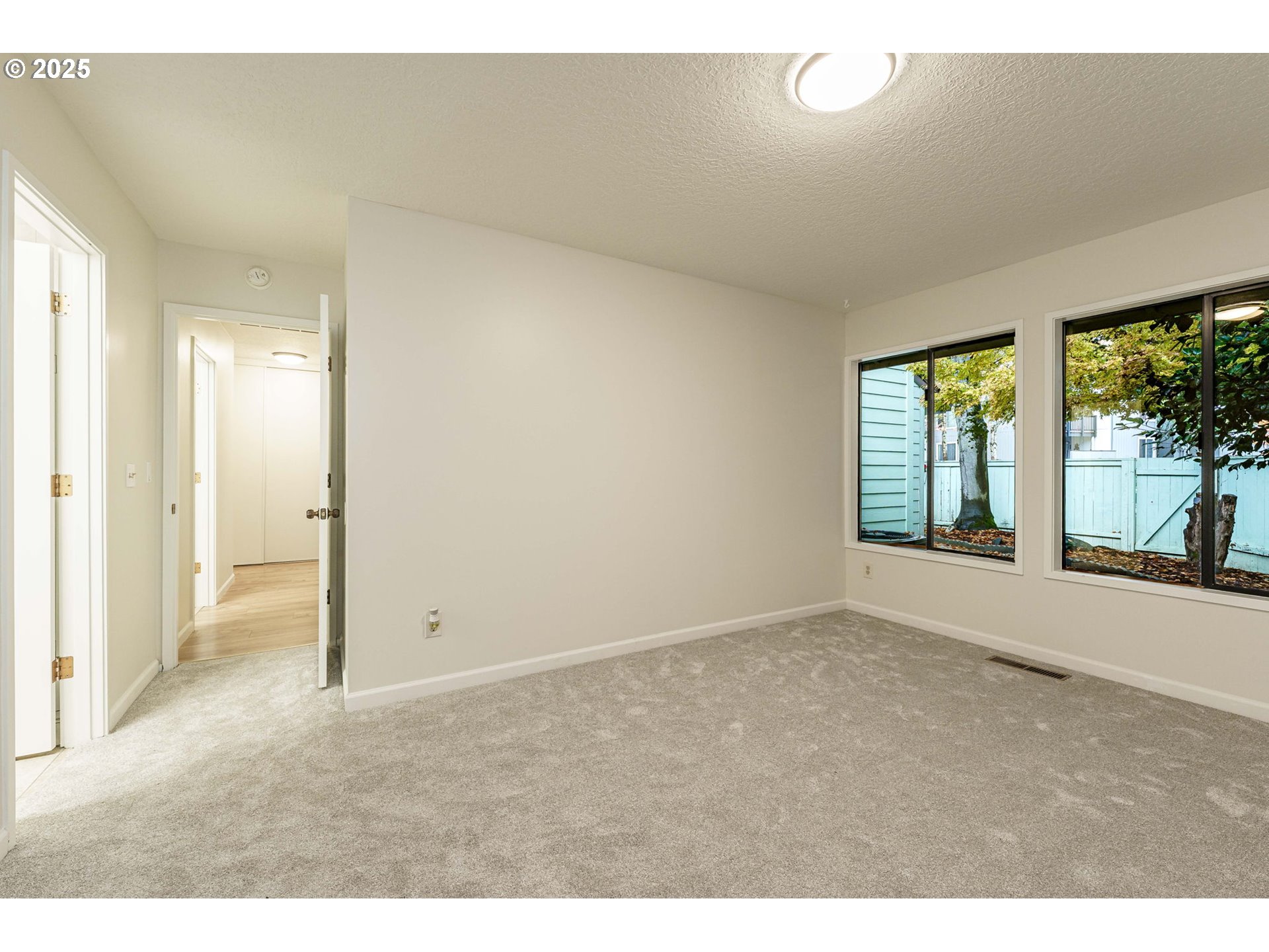 4248 Northeast 125th Place Portland, OR 97230 - Photo 21 of 42 a view of a room with large windows