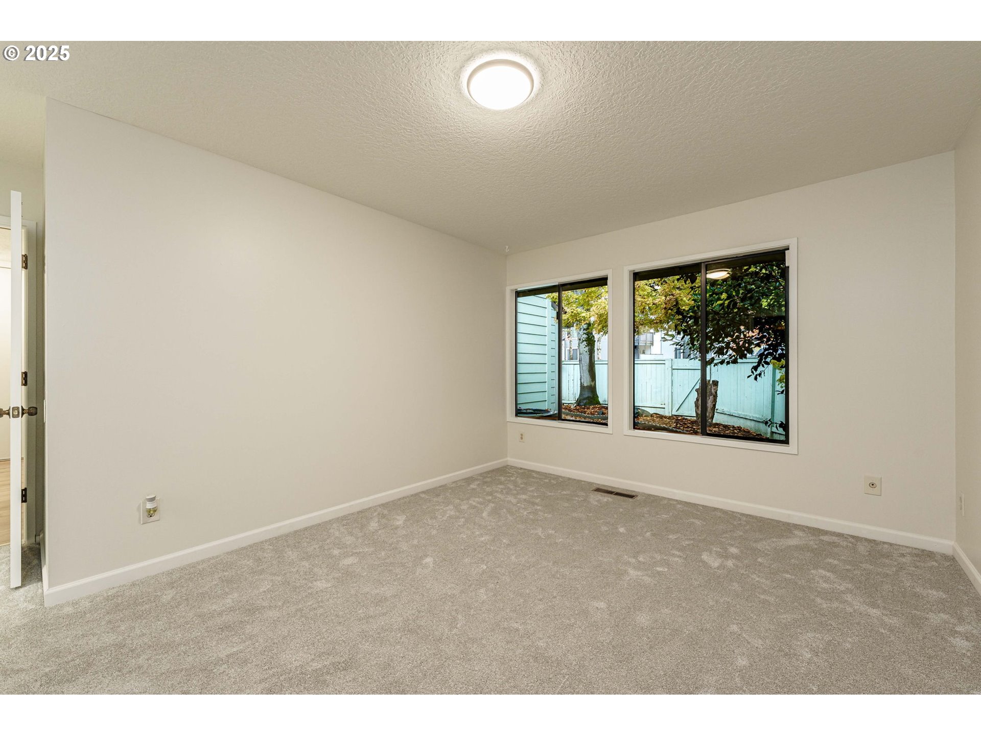 4248 Northeast 125th Place Portland, OR 97230 - Photo 25 of 42 a view of an empty room with a window