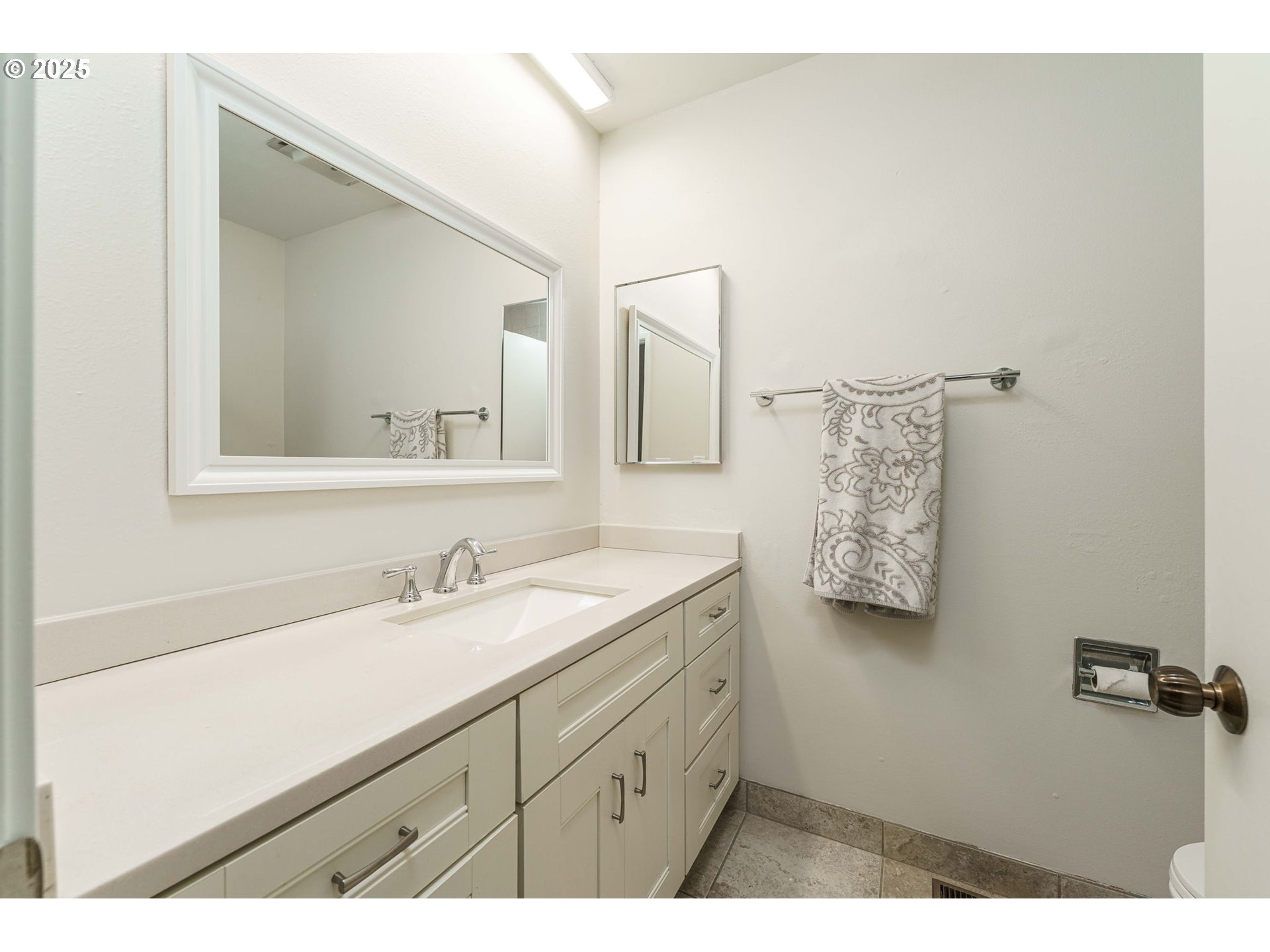 4248 Northeast 125th Place Portland, OR 97230 - Photo 27 of 42 a bathroom with a sink and a mirror