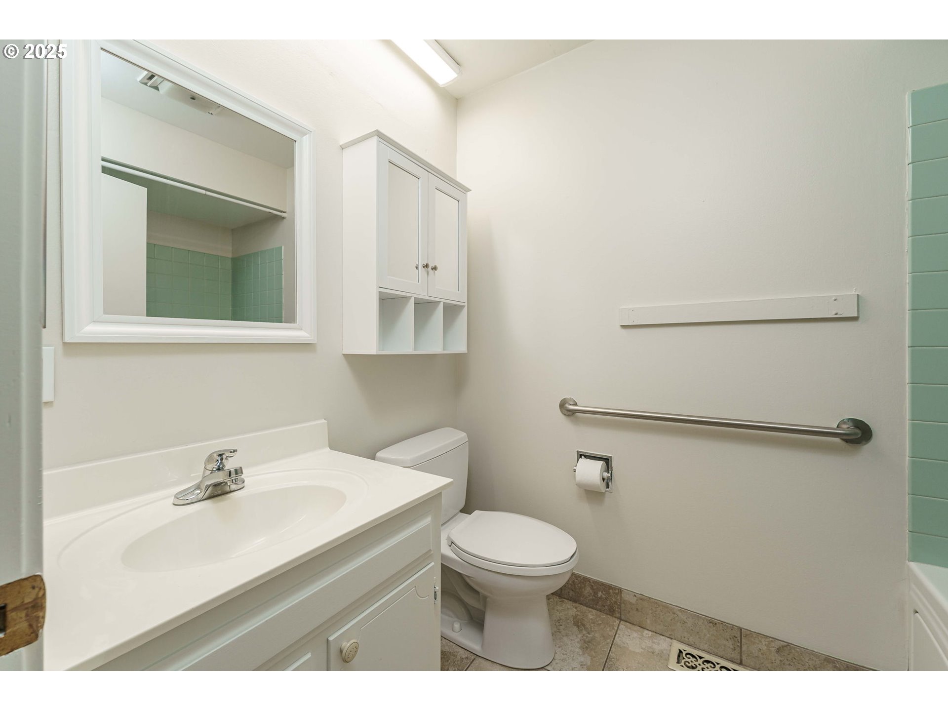 4248 Northeast 125th Place Portland, OR 97230 - Photo 31 of 42 a bathroom with a sink mirror and toilet