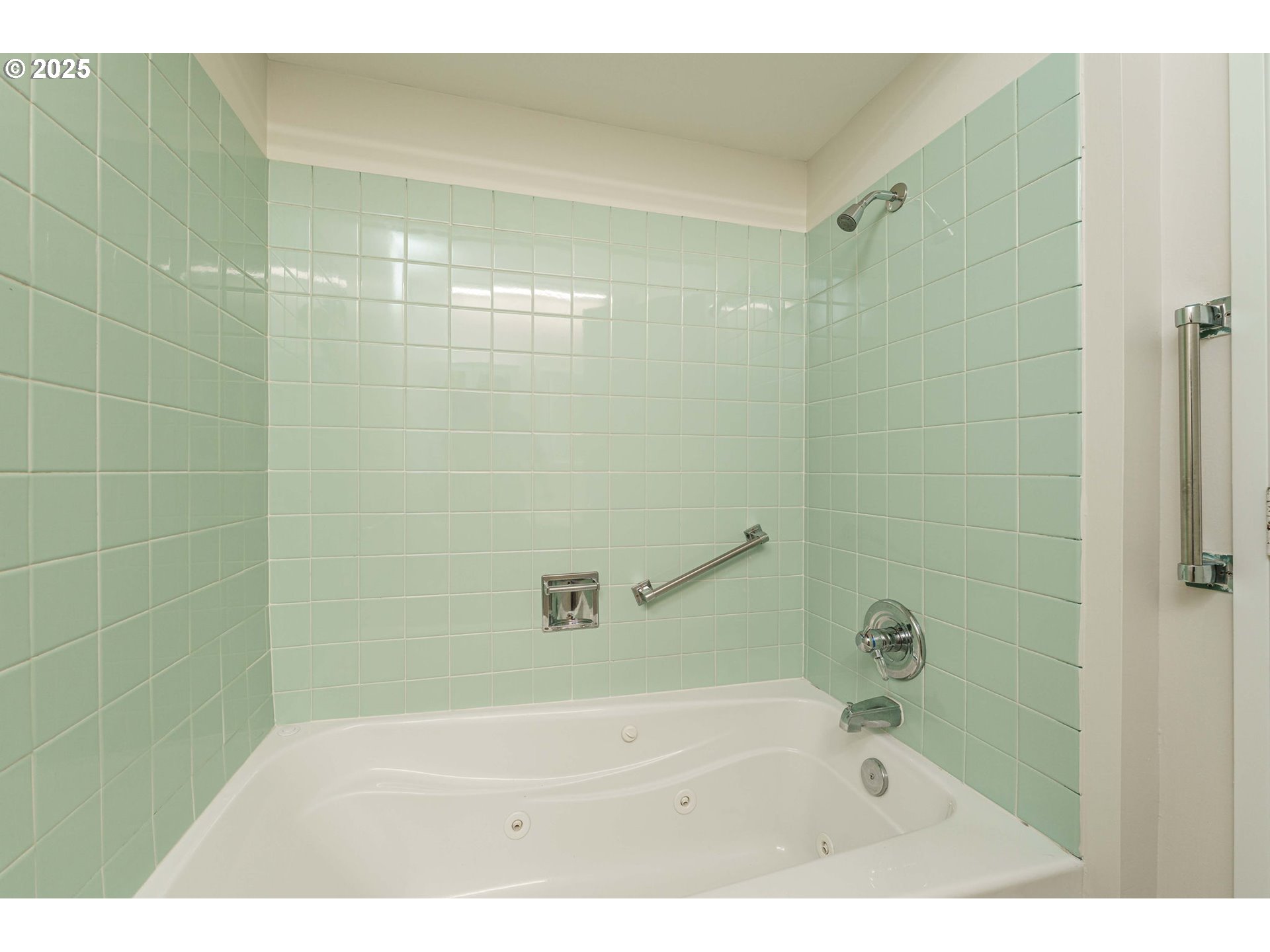 4248 Northeast 125th Place Portland, OR 97230 - Photo 32 of 42 a bathroom with a bathtub