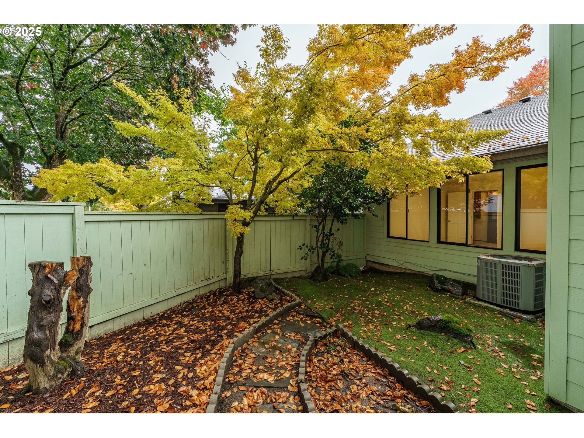 4248 Northeast 125th Place Portland, OR 97230 - Photo 35 of 42 a backyard of a house with lots of green space