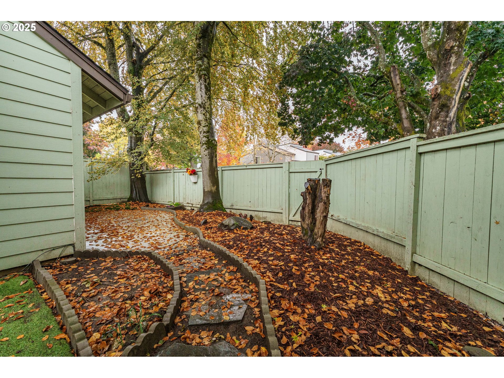 4248 Northeast 125th Place Portland, OR 97230 - Photo 37 of 42 a backyard of a house with lots of green space