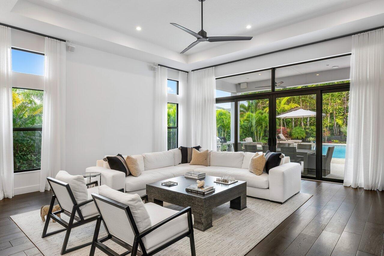 9109 Fiano Place Boca Raton, FL 33496 - Photo 6 of 24 a living room with furniture and a large window
