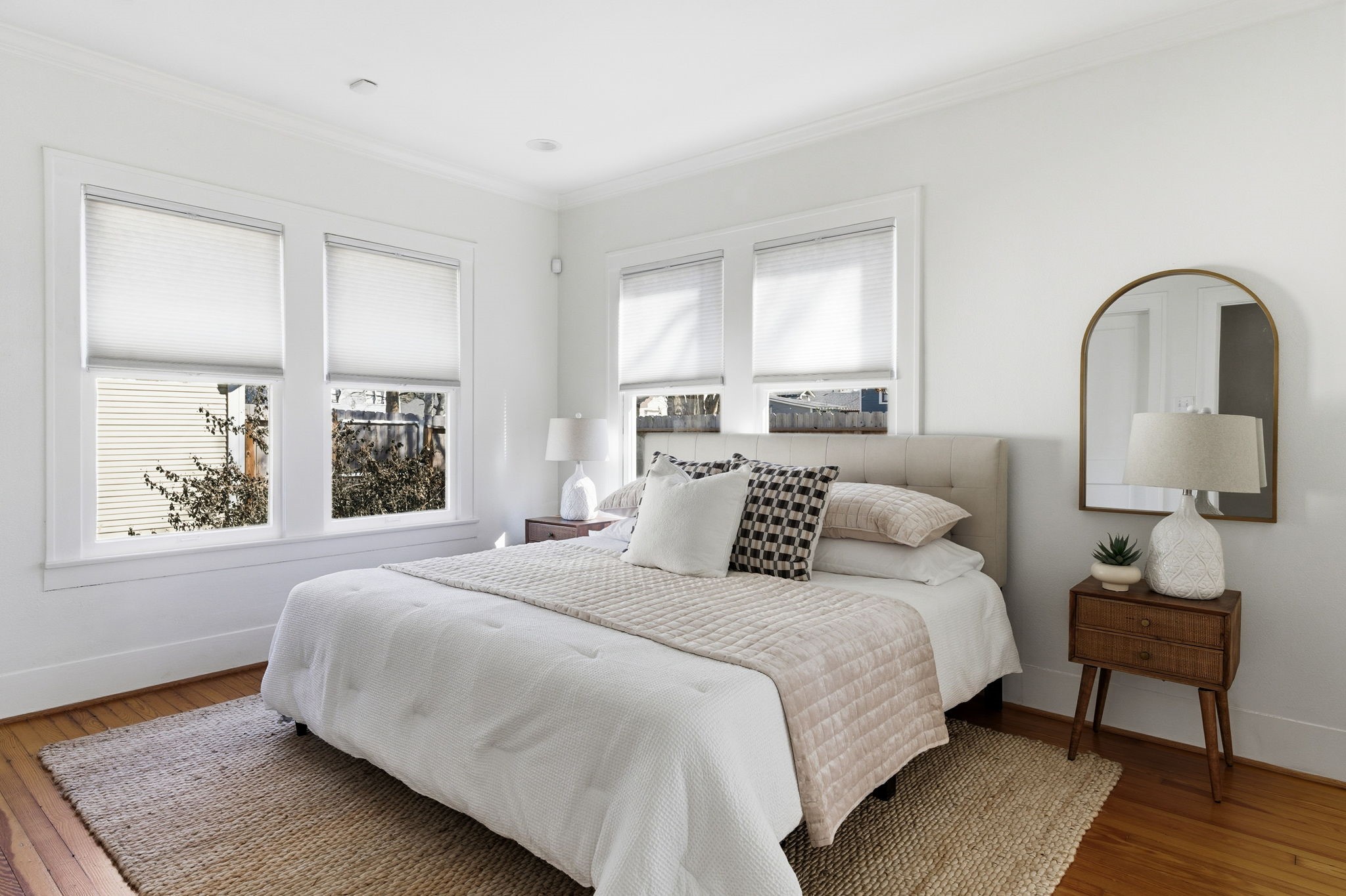 1103 Key Street Houston, TX 77009 - Photo 13 of 35 Primary bedroom in the back with large windows and plenty of natural light.