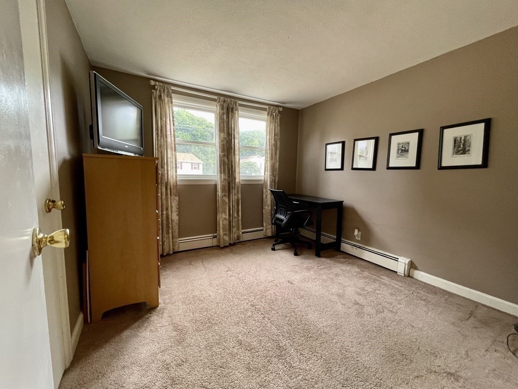 172 Potter Road Framingham, MA 01701 - Photo 11 of 16 an empty room with windows