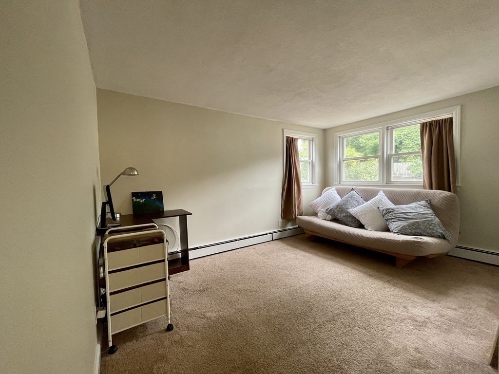 172 Potter Road Framingham, MA 01701 - Photo 12 of 16 a bedroom with furniture and a window