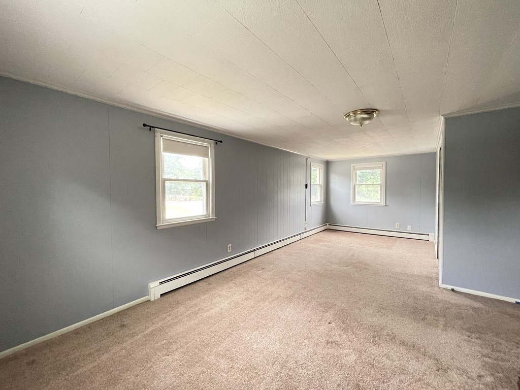 172 Potter Road Framingham, MA 01701 - Photo 8 of 16 an empty room with windows