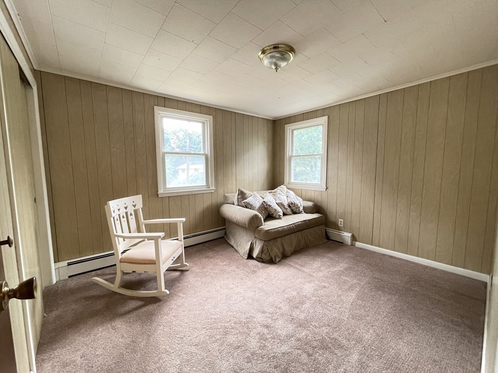 172 Potter Road Framingham, MA 01701 - Photo 9 of 16 a living room with furniture and a window