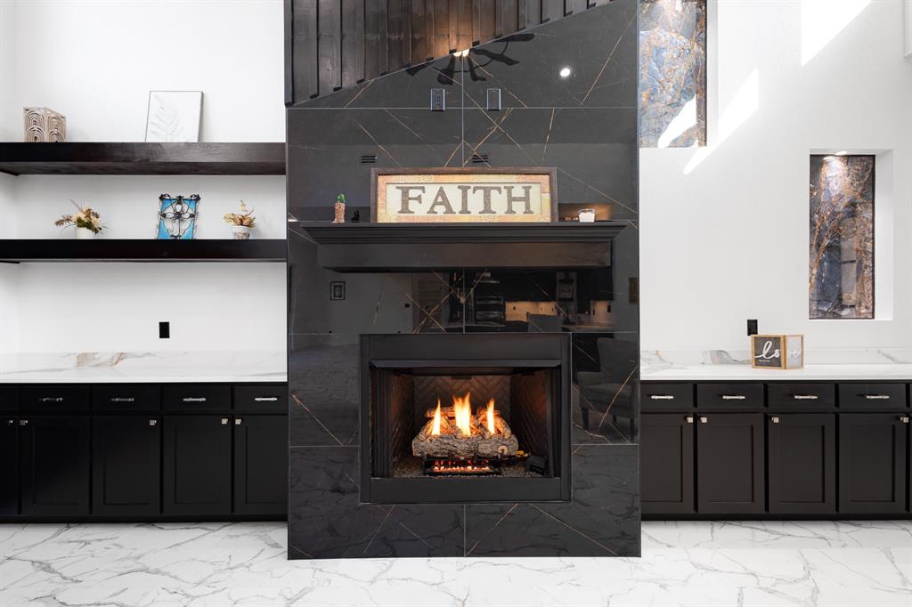 1572 Faulkner Road Sunset, TX 76270 - Photo 14 of 40 a kitchen with a stove and a refrigerator