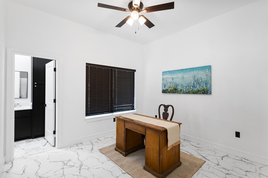 1572 Faulkner Road Sunset, TX 76270 - Photo 31 of 40 a bedroom with furniture and window