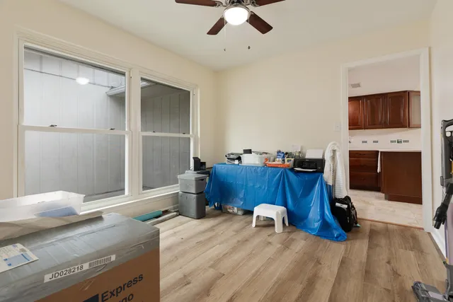 a living room with furniture and a window