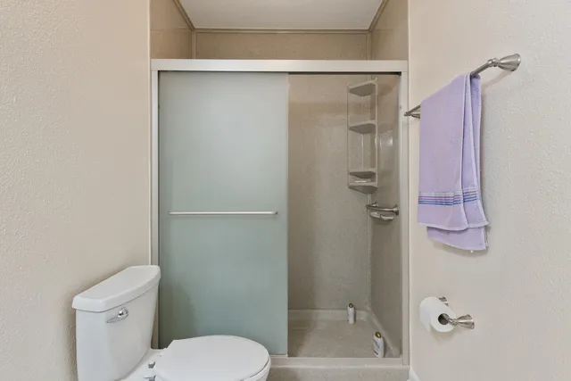 a bathroom with a sink vanity and a mirror