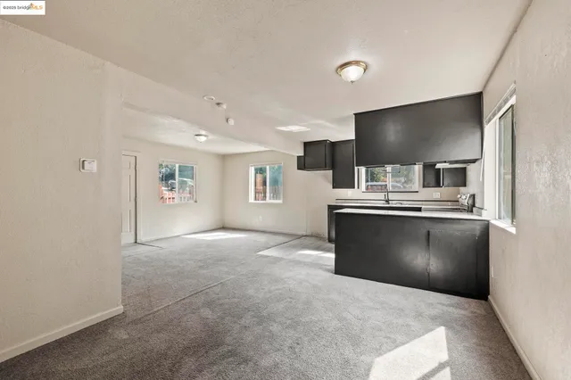 a view of a livingroom with a staircase