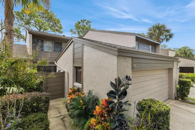 front view of a house with a small yard