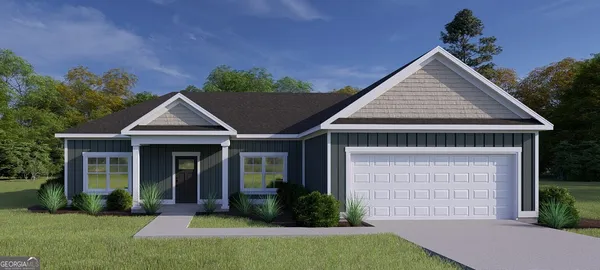 front view of a house with a yard