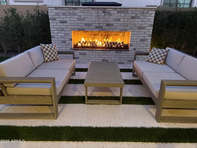 a view of a backyard with pathway