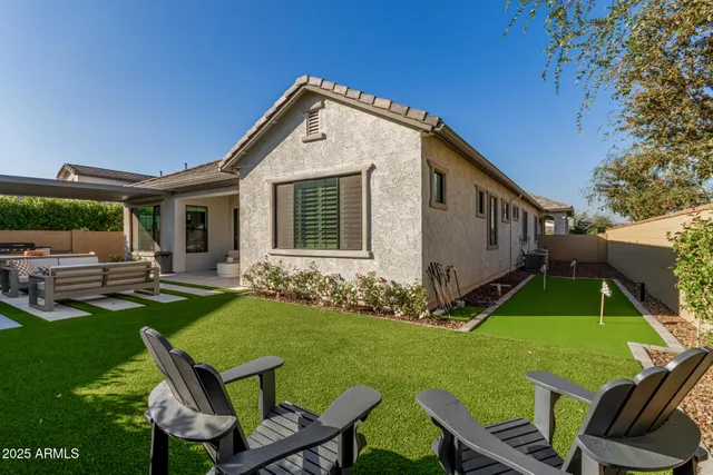 a view of swimming pool with patio
