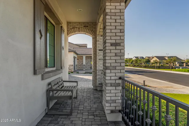 a bathroom with a toilet mirror and sink