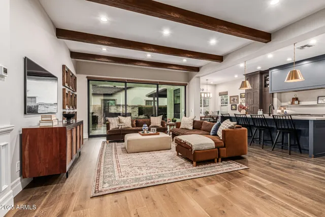 a living room with furniture and a table