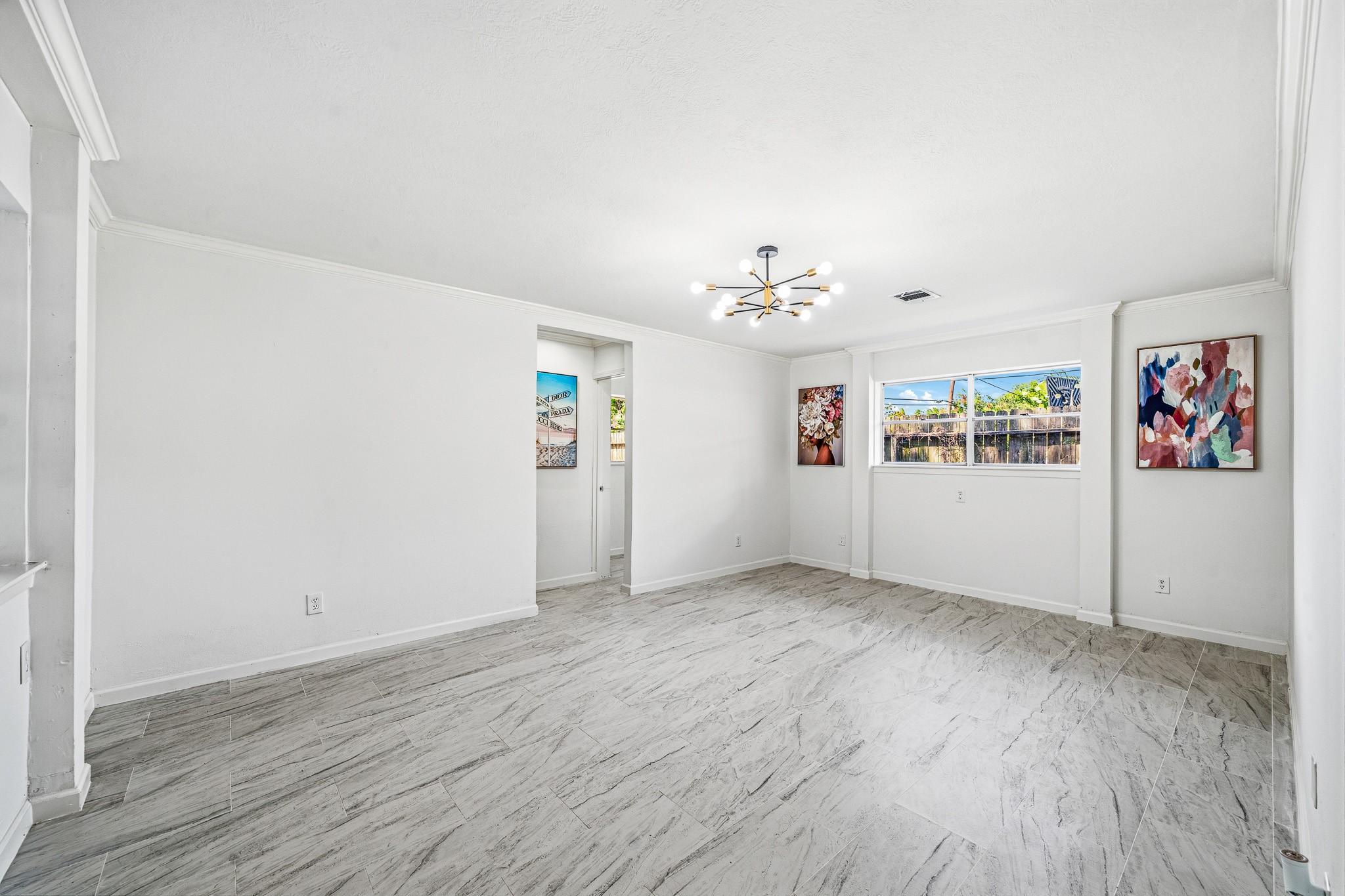 111 Princess Drive Houston, TX 77034 - Photo 19 of 30 an empty room with wooden floor and windows
