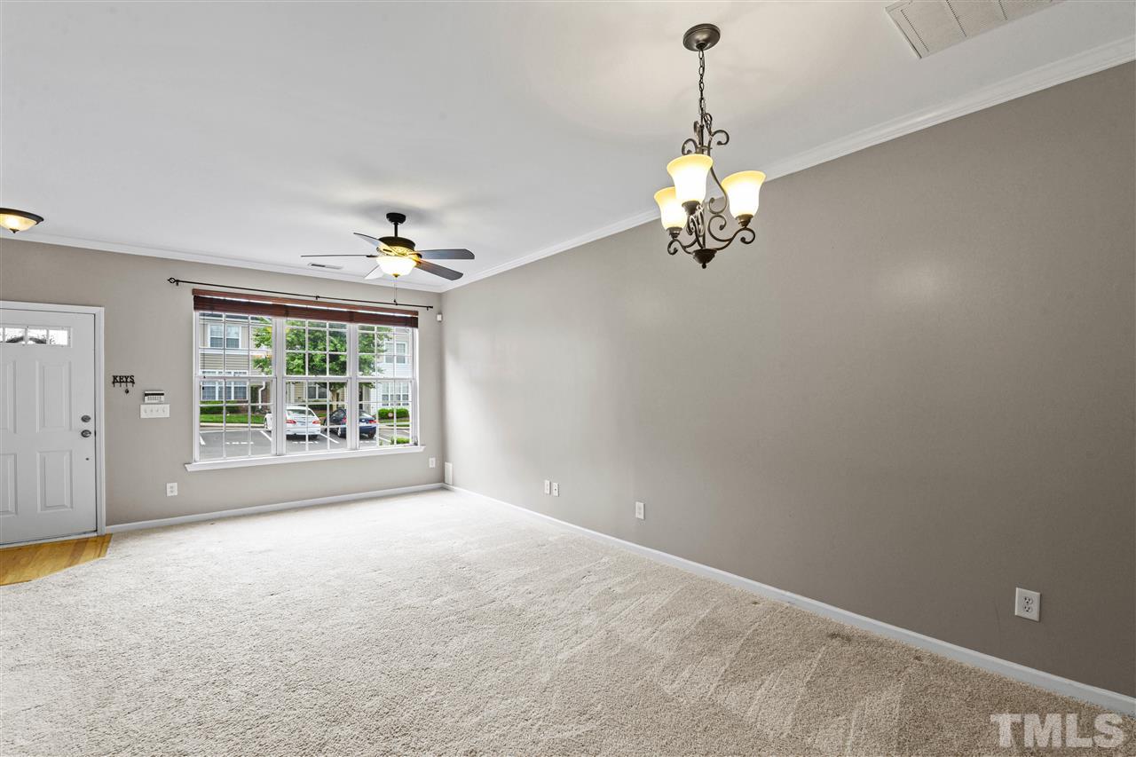4822 Black Mountain Path Raleigh, NC 27612 - Photo 4 of 27 a view of an empty room with a window