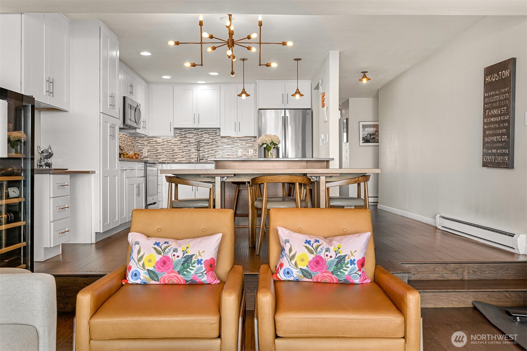 600 South State Street, Unit 212 Bellingham, WA 98225 - Photo 12 of 37 a living room with kitchen island furniture and a kitchen view