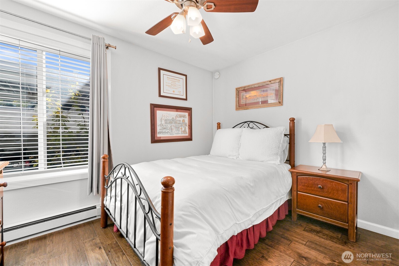 600 South State Street, Unit 212 Bellingham, WA 98225 - Photo 26 of 37 a bedroom with a bed and a window