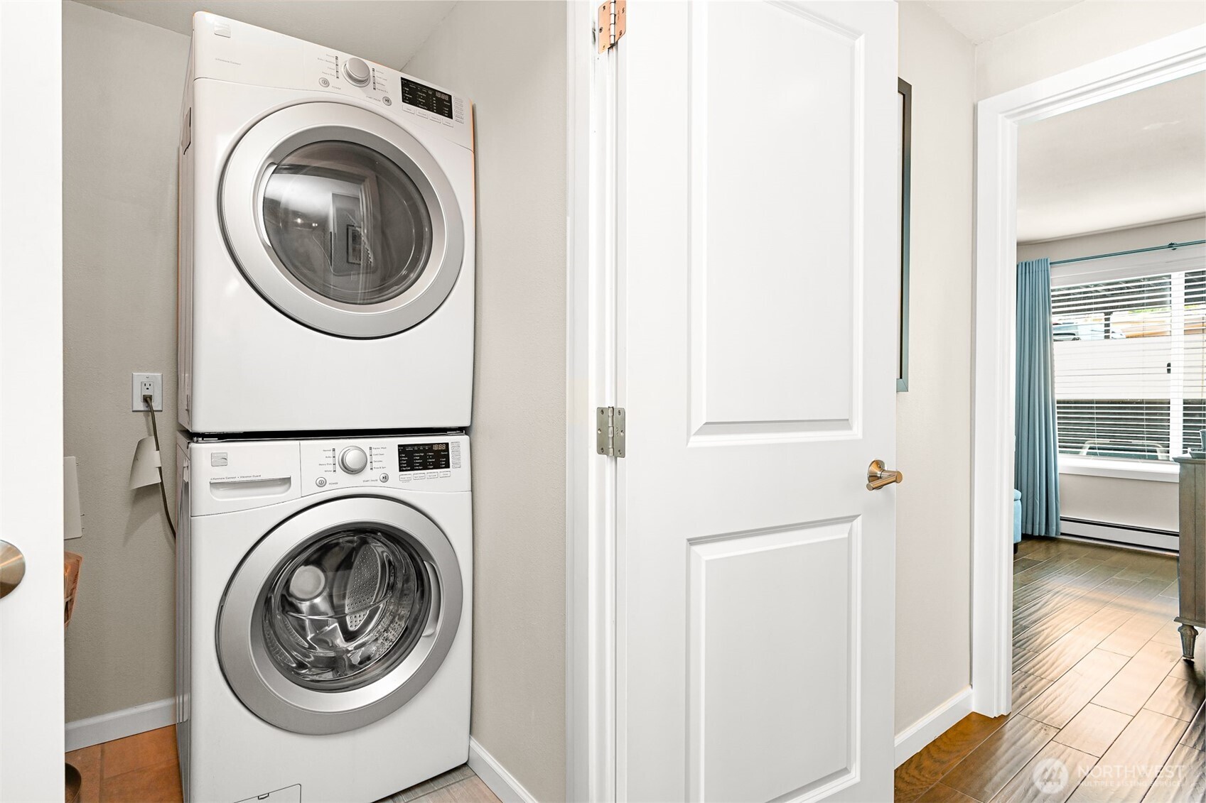 600 South State Street, Unit 212 Bellingham, WA 98225 - Photo 28 of 37 a view of a hallway with washer and dryer