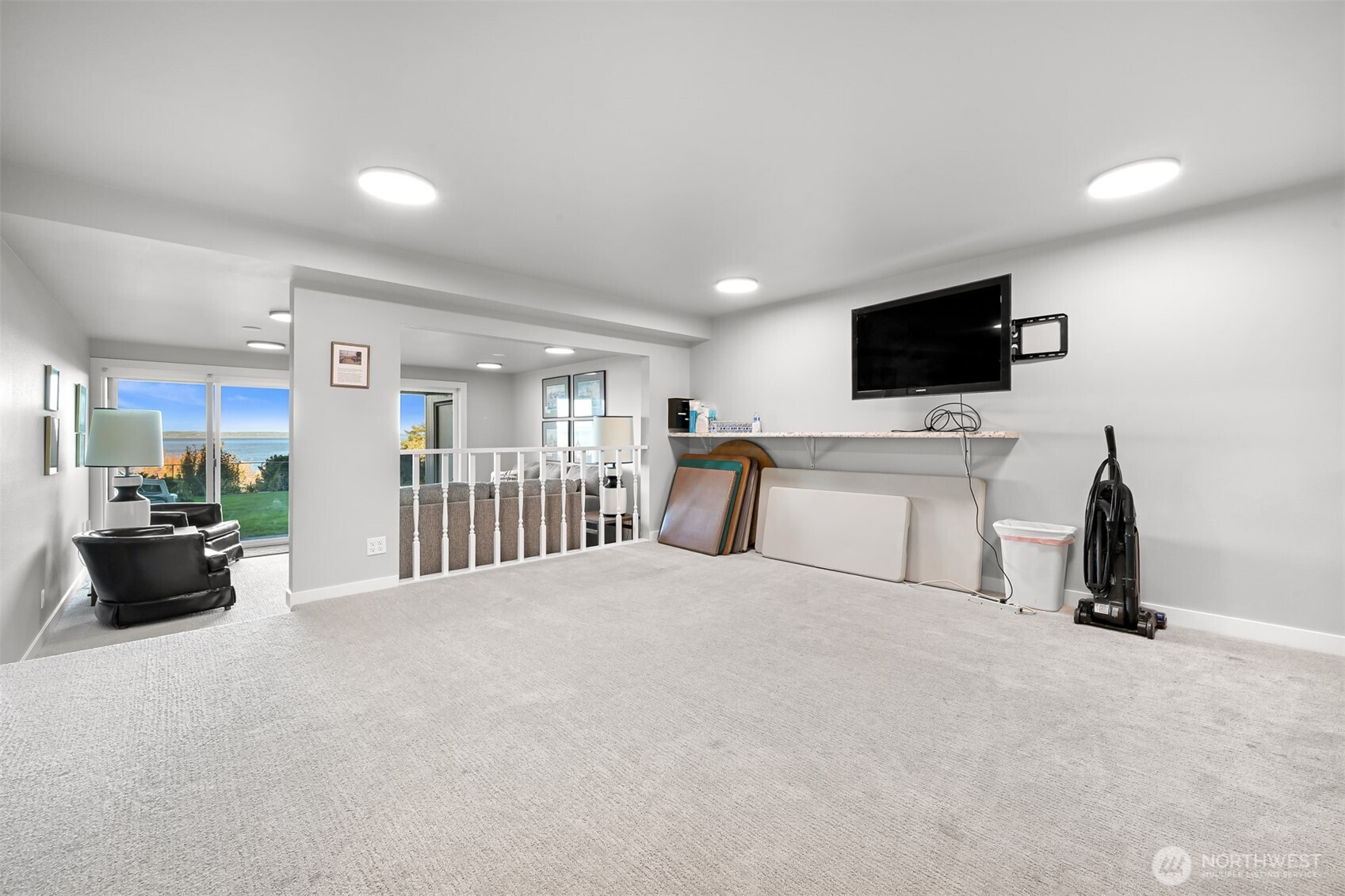 600 South State Street, Unit 212 Bellingham, WA 98225 - Photo 32 of 37 a view of a livingroom with furniture and a flat screen tv