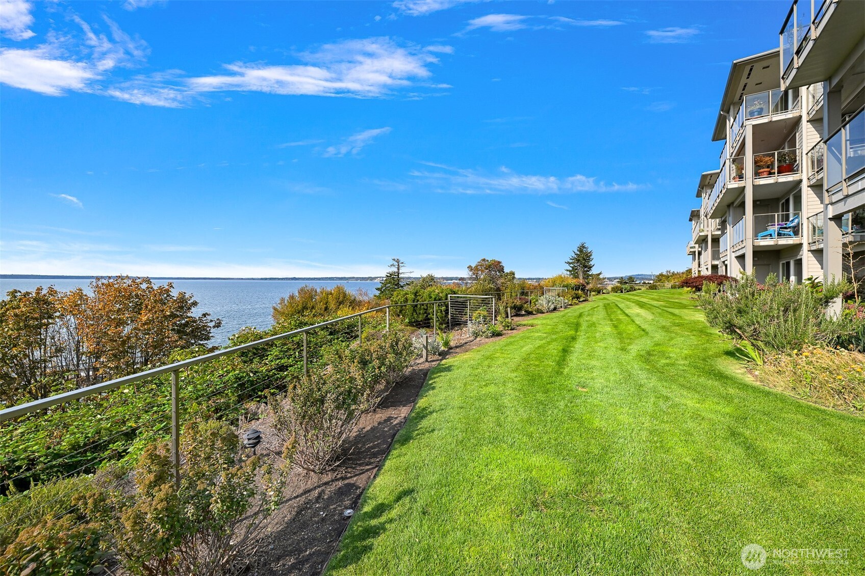 600 South State Street, Unit 212 Bellingham, WA 98225 - Photo 36 of 37 a view of a yard with a lake view