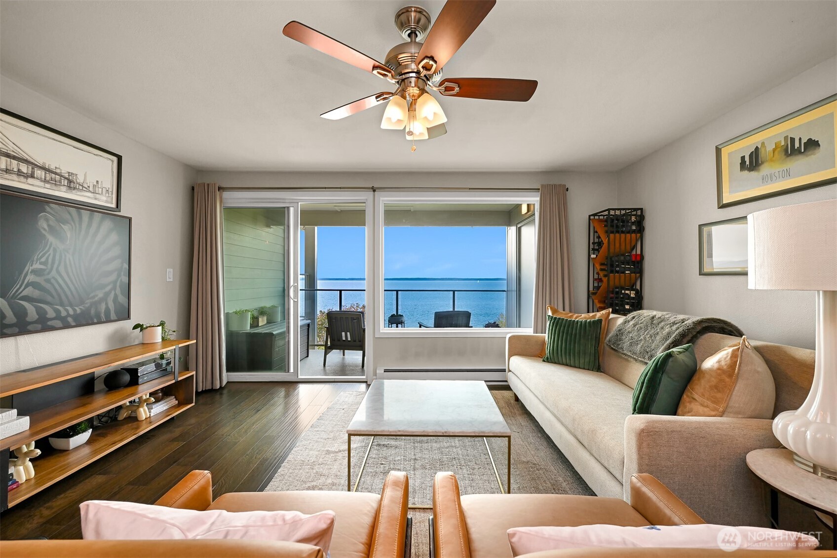 600 South State Street, Unit 212 Bellingham, WA 98225 - Photo 7 of 37 a living room with furniture and a flat screen tv