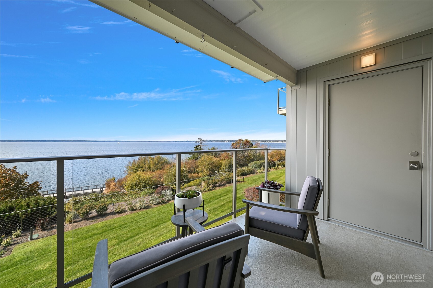 600 South State Street, Unit 212 Bellingham, WA 98225 - Photo 10 of 37 a view of a chairs and table in patio