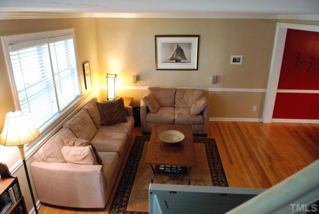 917 St Marys Street Raleigh, NC 27605 - Photo 7 of 13 a living room with furniture and a window