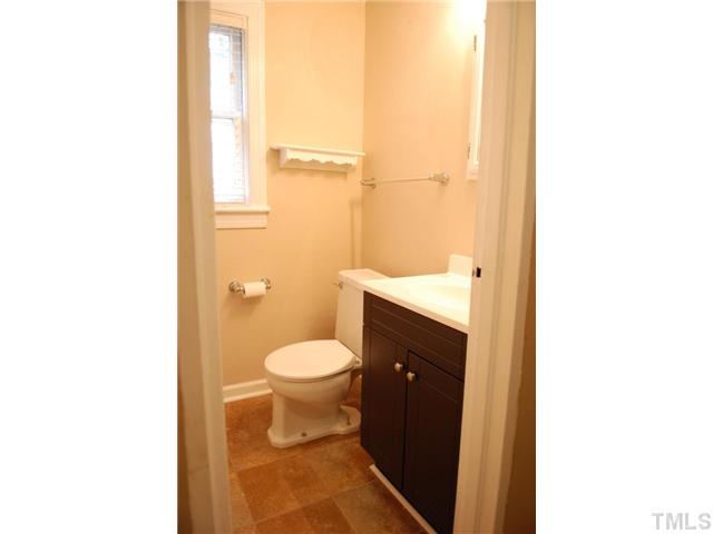917 St Marys Street Raleigh, NC 27605 - Photo 10 of 13 a bathroom with a sink and a toilet